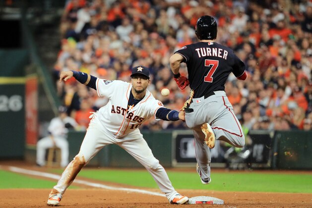 HOUSTON, TEXAS - OCTOBER 29:  Trea Turner #7 of the Washington Nationals is called out on runner interference for colliding with Yuli Gurriel #10 of the Houston Astros during the seventh inning in Game Six of the 2019 World Series at Minute Maid Park on October 29, 2019 in Houston, Texas. (Photo by Mike Ehrmann/Getty Images)