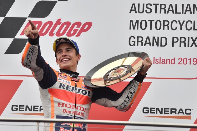 Repsol Honda MotoGP rider Marc Marquez of Spain holds up the trophy after winning the Australian motorcycle Grand Prix at Phillip Island on October 27, 2019. (Photo by PETER PARKS / AFP) / -- IMAGE RESTRICTED TO EDITORIAL USE - STRICTLY NO COMMERCIAL USE -- (Photo by PETER PARKS/AFP via Getty Images)