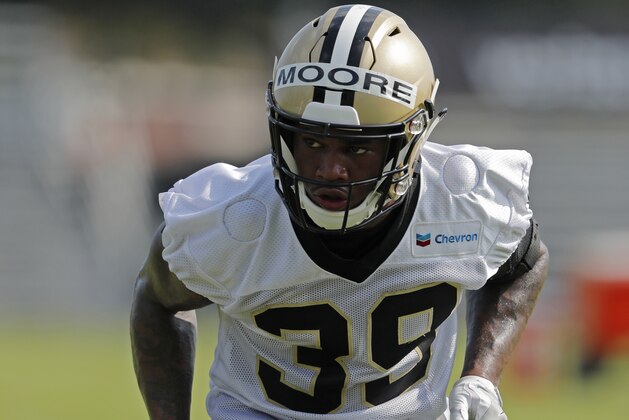 New Orleans Saints defensive back Kamrin Moore (39) goes through drills during training camp at their NFL football training facility in Metairie, La., Friday, July 27, 2018. (AP Photo/Gerald Herbert)