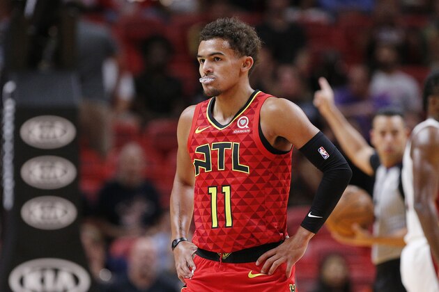 MIAMI, FLORIDA - OCTOBER 29: Trae Young #11 of the Atlanta Hawks reacts against the Miami Heat during the first half at American Airlines Arena on October 29, 2019 in Miami, Florida. NOTE TO USER: User expressly acknowledges and agrees that, by downloading and/or using this photograph, user is consenting to the terms and conditions of the Getty Images License Agreement. (Photo by Michael Reaves/Getty Images)