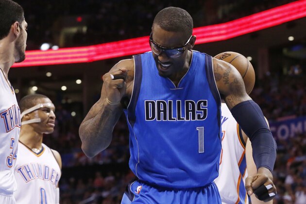 Dallas Mavericks center Amar'e Stoudemire (1) pumps his fist in the first quarter of an NBA basketball game against the Oklahoma City Thunder in Oklahoma City, Wednesday, April 1, 2015. (AP Photo/Sue Ogrocki)