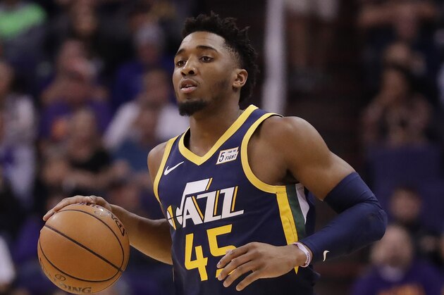 Utah Jazz guard Donovan Mitchell (45) against the Phoenix Suns during the first half of an NBA basketball game, Monday, Oct. 28, 2019, in Phoenix. (AP Photo/Matt York)