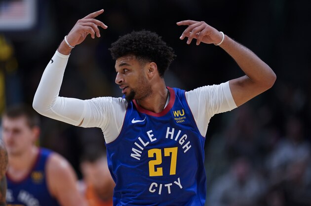 Denver Nuggets guard Jamal Murray celebrates a basket against the Phoenix Suns during the third quarter of an NBA basketball game, Friday, Oct. 25, 2019, in Denver. (AP Photo/Jack Dempsey)