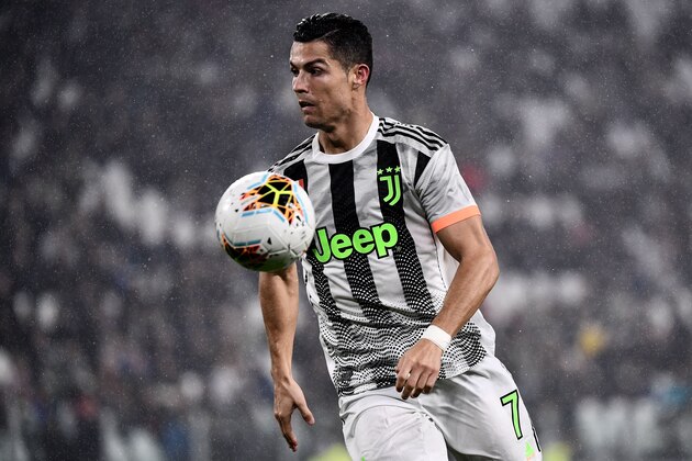 Juventus' Portuguese forward Cristiano Ronaldo controls the ball during the Italian Serie A football match between Juventus and Genoa on October 30, 2019 at the 'Allianz Stadium' in Turin. (Photo by MARCO BERTORELLO / AFP) (Photo by MARCO BERTORELLO/AFP via Getty Images)