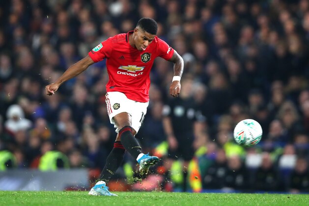 LONDON, ENGLAND - OCTOBER 30: Marcus Rashford of Manchester United scores his teams second goal  during the Carabao Cup Round of 16 match between Chelsea FC and Manchester United at Stamford Bridge on October 30, 2019 in London, England. (Photo by Chloe Knott - Danehouse/Getty Images)