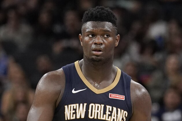 New Orleans Pelicans' Zion Williamson walks upcourt during the second half of an NBA preseason basketball game against the San Antonio Spurs, Sunday, Oct. 13, 2019, in San Antonio. (AP Photo/Darren Abate) New Orleans Pelicans' Zion Williamson walks upcourt during the second half of an NBA preseason basketball game against the San Antonio Spurs, Sunday, Oct. 13, 2019, in San Antonio. (AP Photo/Darren Abate)