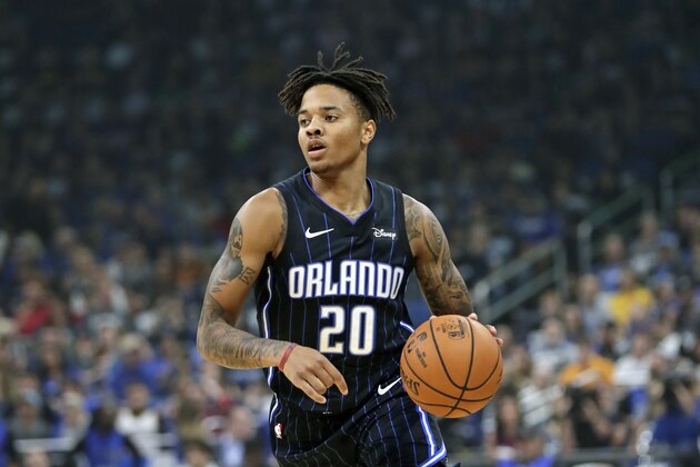Orlando Magic's Markelle Fultz (20) moves the ball against the Cleveland Cavaliers during the first half of an NBA basketball game, Wednesday, Oct. 23, 2019, in Orlando, Fla. (AP Photo/John Raoux)