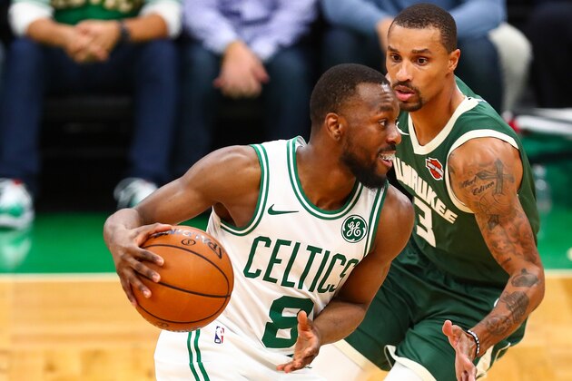 BOSTON, MA - OCTOBER 30:  Kemba Walker #8 of the Boston Celtics dribbles the ball while guarded by George Hill #3 of the Milwaukee Bucks during a game at TD Garden on October 30, 2019 in Boston, Massachusetts. NOTE TO USER: User expressly acknowledges and agrees that, by downloading and or using this photograph, User is consenting to the terms and conditions of the Getty Images License Agreement. (Photo by Adam Glanzman/Getty Images)
