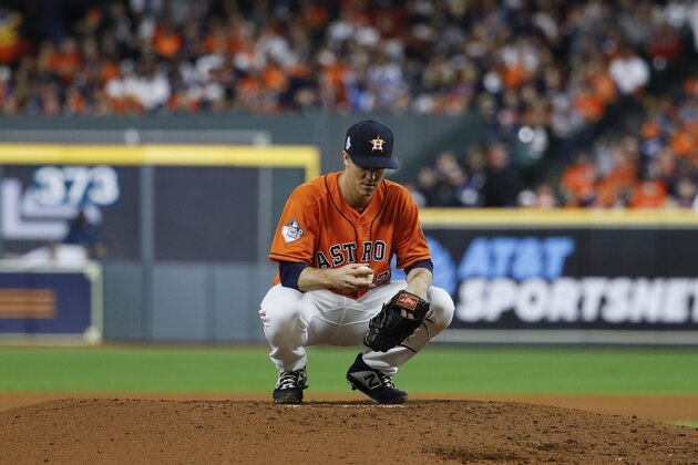 Houston Astros starting pitcher Zack Greinke pauses during the fourth inning of Game 7 of the baseball World Series against the Washington Nationals Wednesday, Oct. 30, 2019, in Houston. (AP Photo/Matt Slocum)