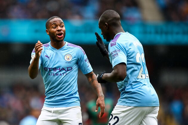 MANCHESTER, ENGLAND - OCTOBER 26: Raheem Sterling of Manchester City and Benjamin Mendy of Manchester City during the Premier League match between Manchester City and Aston Villa at Etihad Stadium on October 26, 2019 in Manchester, United Kingdom. (Photo by Robbie Jay Barratt - AMA/Getty Images)