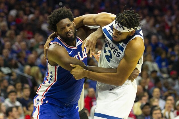 PHILADELPHIA, PA - OCTOBER 30: Joel Embiid #21 of the Philadelphia 76ers gets in a fight with Karl-Anthony Towns #32 of the Minnesota Timberwolves in the third quarter at the Wells Fargo Center on October 30, 2019 in Philadelphia, Pennsylvania. NOTE TO USER: User expressly acknowledges and agrees that, by downloading and or using this photograph, User is consenting to the terms and conditions of the Getty Images License Agreement. (Photo by Mitchell Leff/Getty Images)