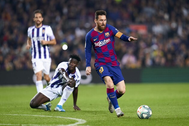 BARCELONA, SPAIN - OCTOBER 29: Lionel Messi of FC Barcelona competes for the ball with Mohammed Salisu of Real Valladolid CF during the Liga match between FC Barcelona and Real Valladolid CF at Camp Nou on October 29, 2019 in Barcelona, Spain. (Photo by Quality Sport Images/Getty Images)