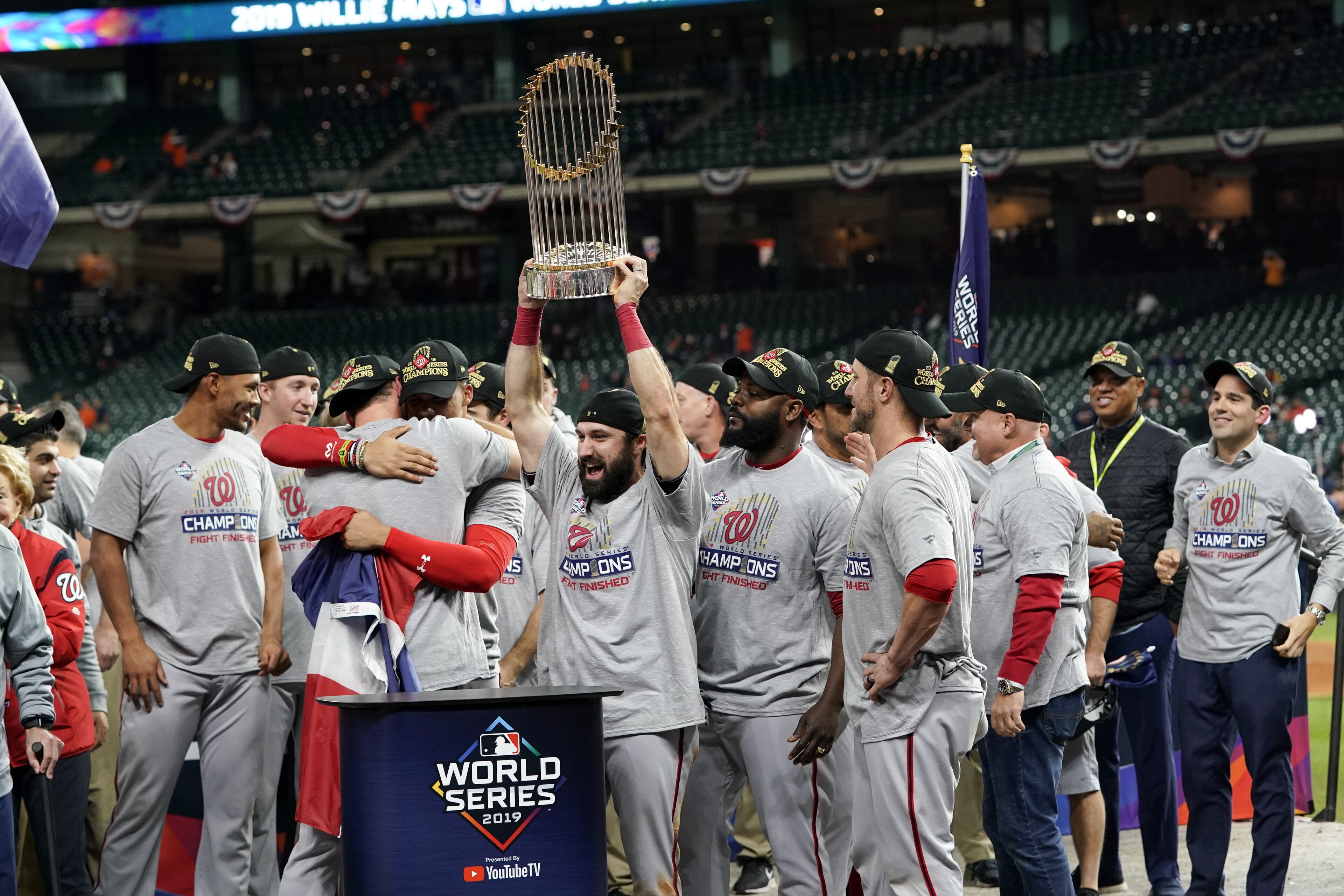 The Washington Nationals celebrate with the trophy after Game 7 of the baseball World Series against the Houston Astros Wednesday, Oct. 30, 2019, in Houston. The Nationals won 6-2 to win the series. (AP Photo/David J. Phillip) The Washington Nationals celebrate with the trophy after Game 7 of the baseball World Series against the Houston Astros Wednesday, Oct. 30, 2019, in Houston. The Nationals won 6-2 to win the series. (AP Photo/David J. Phillip)