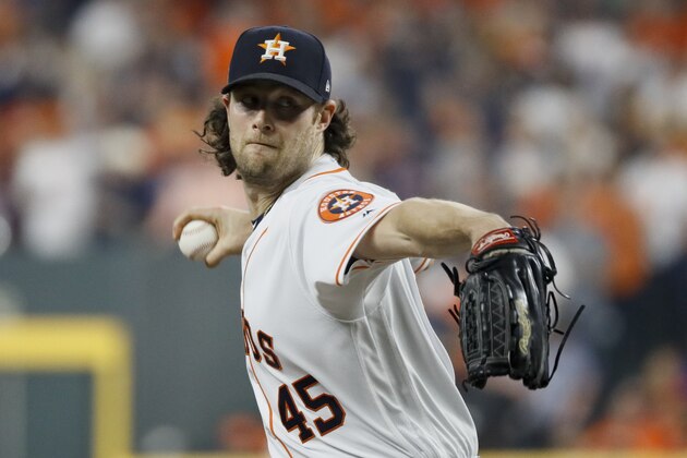 Houston Astros starting pitcher Gerrit Cole throws against the Washington Nationals during the first inning of Game 1 of the baseball World Series Tuesday, Oct. 22, 2019, in Houston. (AP Photo/Matt Slocum)