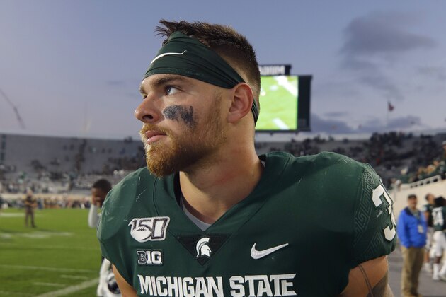 Michigan State linebacker Joe Bachie walks off the field following an NCAA college football game against Indiana, Saturday, Sept. 28, 2019, in East Lansing, Mich. (AP Photo/Al Goldis)