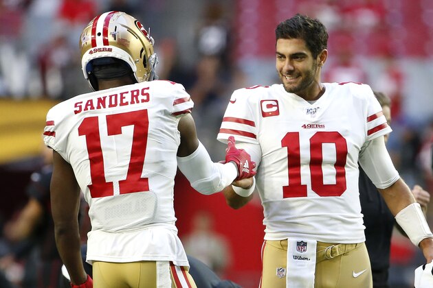 GLENDALE, ARIZONA - OCTOBER 31: Quarterback Jimmy Garoppolo #10 of the San Francisco 49ers greets teammate Emmanuel Sanders #17 prior to the NFL football game against the Arizona Cardinals at State Farm Stadium on October 31, 2019 in Glendale, Arizona. (Photo by Ralph Freso/Getty Images)