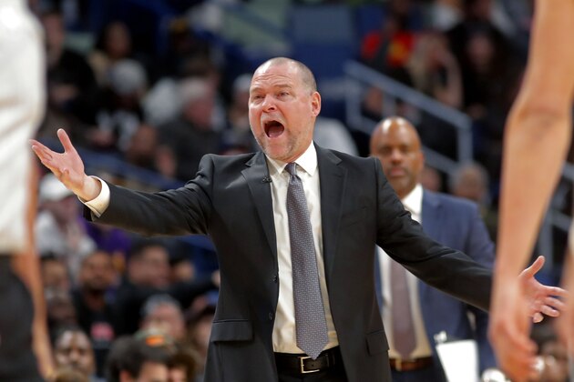 Denver Nuggets coach Michael Malone reacts from the bench area during the second half of the team's NBA basketball game against the New Orleans Pelicans in New Orleans, Thursday, Oct. 31, 2019. The Pelicans won 122-107. (AP Photo/Gerald Herbert)