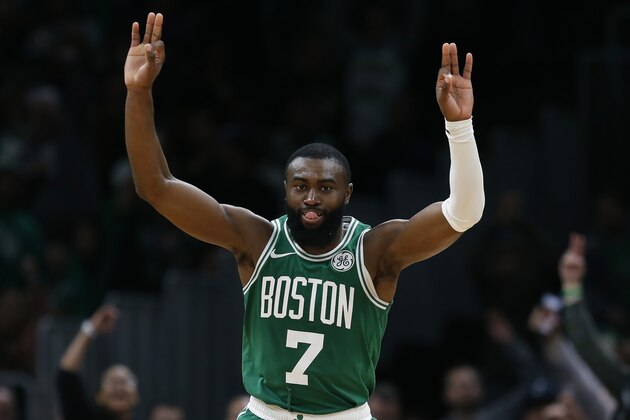 Boston Celtics' Jaylen Brown reacts after scoring a 3-pointer during the second half of the team's NBA basketball game against the Toronto Raptors in Boston, Friday, Oct. 25, 2019. (AP Photo/Michael Dwyer)