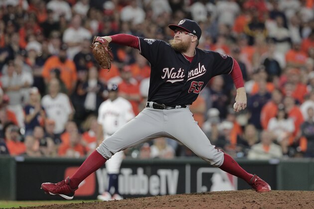 Washington Nationals' Sean Doolittle throws during the ninth inning of Game 6 of the baseball World Series against the Houston Astros Tuesday, Oct. 29, 2019, in Houston. (AP Photo/David J. Phillip)