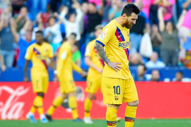 Barcelona's Argentinian Forward Lionel Messi reacts to Levante's goal looking downwards during the Spanish League football match between Levante UD and FC Barcelona at the Ciutat de Valencia stadium in Valencia, on November 2, 2019. (Photo by JOSE JORDAN / AFP) (Photo by JOSE JORDAN/AFP via Getty Images)