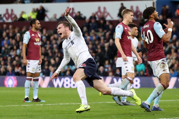 BIRMINGHAM, ENGLAND - NOVEMBER 02: Andy Robertson of Liverpool celebrates after scoring his team's first goal during the Premier League match between Aston Villa and Liverpool FC at Villa Park on November 02, 2019 in Birmingham, United Kingdom. (Photo by Marc Atkins/Getty Images)