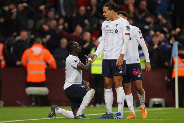 BIRMINGHAM, ENGLAND - NOVEMBER 02: 	Sadio Mane of Liverpool celebrates after scoring a goal to make it 1-2 during the Premier League match between Aston Villa and Liverpool FC at Villa Park on November 2, 2019 in Birmingham, United Kingdom. (Photo by Matthew Ashton - AMA/Getty Images)