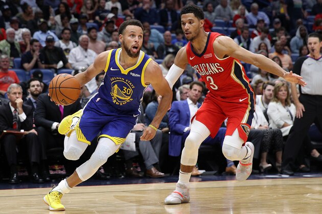 NEW ORLEANS, LOUISIANA - OCTOBER 28: Stephen Curry #30 of the Golden State Warriors drives the ball around Josh Hart #3 of the New Orleans Pelicans at Smoothie King Center on October 28, 2019 in New Orleans, Louisiana. NOTE TO USER: User expressly acknowledges and agrees that, by downloading and/or using this photograph, user is consenting to the terms and conditions of the Getty Images License Agreement (Photo by Chris Graythen/Getty Images)
