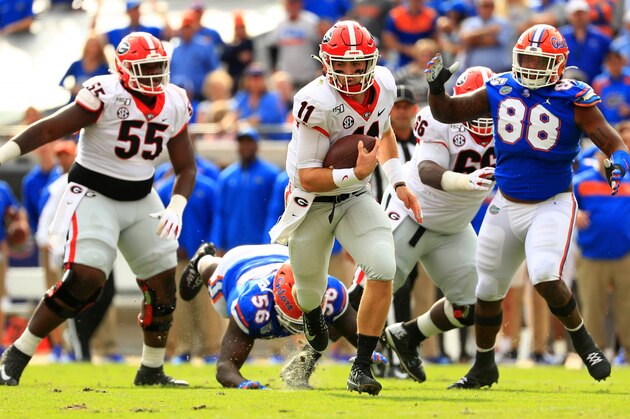 JACKSONVILLE, FLORIDA - NOVEMBER 02: Jake Fromm #11 of the Georgia Bulldogs rushes during a game against the Georgia Bulldogs on November 02, 2019 in Jacksonville, Florida. (Photo by Mike Ehrmann/Getty Images)
