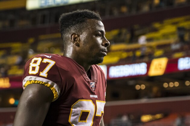 LANDOVER, MD - SEPTEMBER 23: Jeremy Sprinkle #87 of the Washington Redskins leaves the field with Steven Sims #15 after the game against the Chicago Bears at FedExField on September 23, 2019 in Landover, Maryland. (Photo by Scott Taetsch/Getty Images)