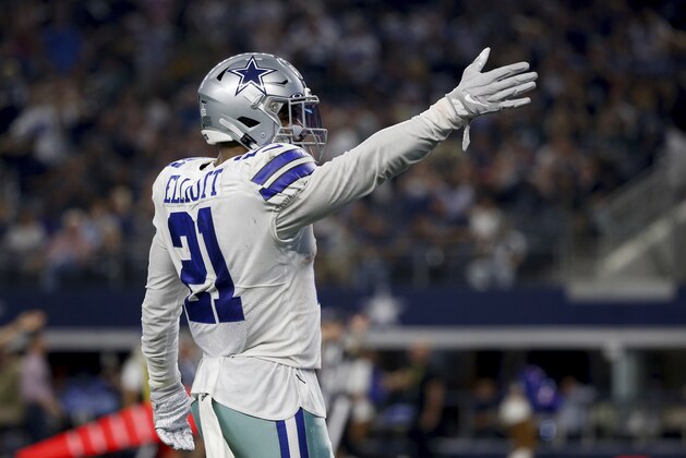 Dallas Cowboys' Ezekiel Elliott (21) celebrates running the ball for a first down against the Philadelphia Eagles in the first half of an NFL football game in Arlington, Texas, Sunday, Oct. 20, 2019. (AP Photo/Ron Jenkins)