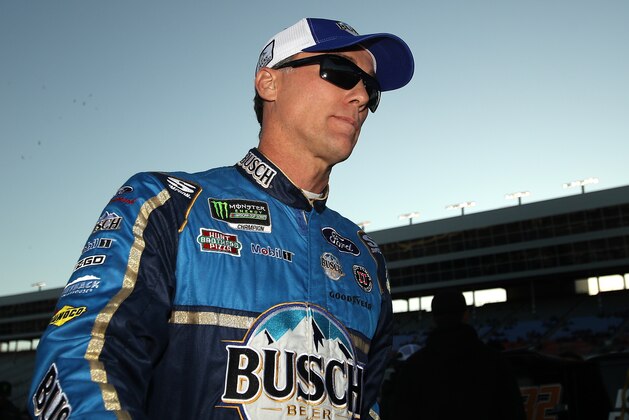 FORT WORTH, TEXAS - NOVEMBER 02: Kevin Harvick, driver of the #4 Busch Beer/Ducks Unlimited Ford, walks on the grid during the Salute to Veterans Qualifying Day Fueled by The Texas Lottery for the Monster Energy NASCAR Cup Series AAA Texas 500 at Texas Motor Speedway on November 02, 2019 in Fort Worth, Texas. (Photo by Chris Graythen/Getty Images)