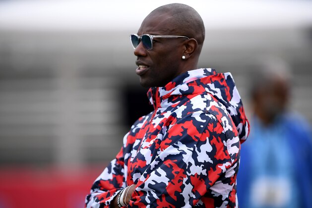 BOCA RATON, FLORIDA - OCTOBER 12: Former NFL Player Terrell Owens on the field prior to the game between the Florida Atlantic Owls and the Middle Tennessee Blue Raiders  at FAU Stadium on October 12, 2019 in Boca Raton, Florida. (Photo by Mark Brown/Getty Images)