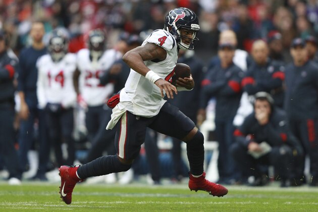 Houston Texans quarterback Deshaun Watson (4) runs down field against the Jacksonville Jaguars during the first half of an NFL football game at Wembley Stadium, Sunday, Nov. 3, 2019, in London. (AP Photo/Ian Walton)