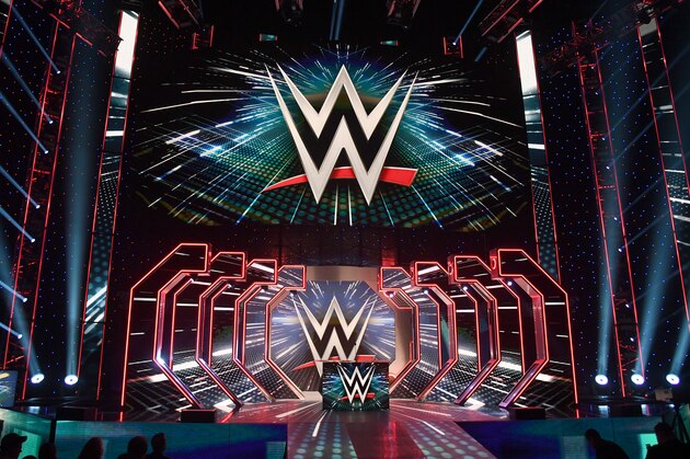 LAS VEGAS, NEVADA - OCTOBER 11:  WWE logos are shown on screens before a WWE news conference at T-Mobile Arena on October 11, 2019 in Las Vegas, Nevada. It was announced that WWE wrestler Braun Strowman will face heavyweight boxer Tyson Fury and WWE champion Brock Lesnar will take on former UFC heavyweight champion Cain Velasquez at the WWE's Crown Jewel event at Fahd International Stadium in Riyadh, Saudi Arabia on October 31.  (Photo by Ethan Miller/Getty Images)