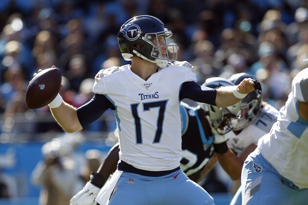 Tennessee Titans quarterback Ryan Tannehill (17) passes against the Carolina Panthers during the first half of an NFL football game in Charlotte, N.C., Sunday, Nov. 3, 2019. (AP Photo/Brian Blanco)