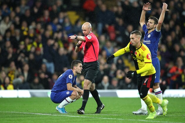 WATFORD, ENGLAND - NOVEMBER 02: Mateo Kovacic and Cesar Azpilicueta of Chelsea react as Match Referee Anthony Taylor points to the penalty spot after a VAR decision during the Premier League match between Watford FC and Chelsea FC at Vicarage Road on November 02, 2019 in Watford, United Kingdom. (Photo by Christopher Lee/Getty Images)