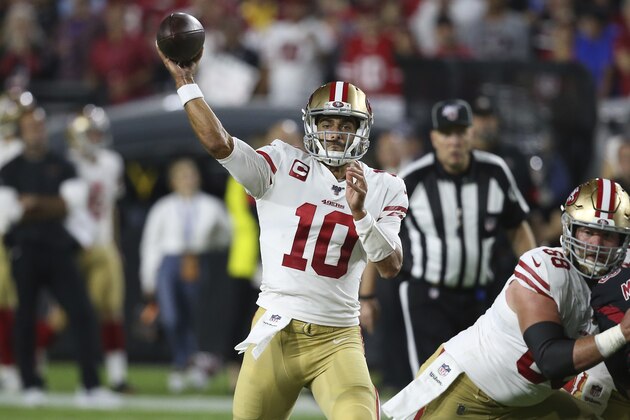 San Francisco 49ers quarterback Jimmy Garoppolo (10) throws against the Arizona Cardinals during the first half of an NFL football game, Thursday, Oct. 31, 2019, in Glendale, Ariz. (AP Photo/Ross D. Franklin)