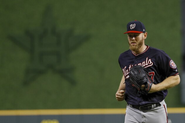 Washington Nationals starting pitcher Stephen Strasburg heads to the dugout after the third inning of Game 6 of the baseball World Series against the Houston Astros Tuesday, Oct. 29, 2019, in Houston. (AP Photo/Matt Slocum)