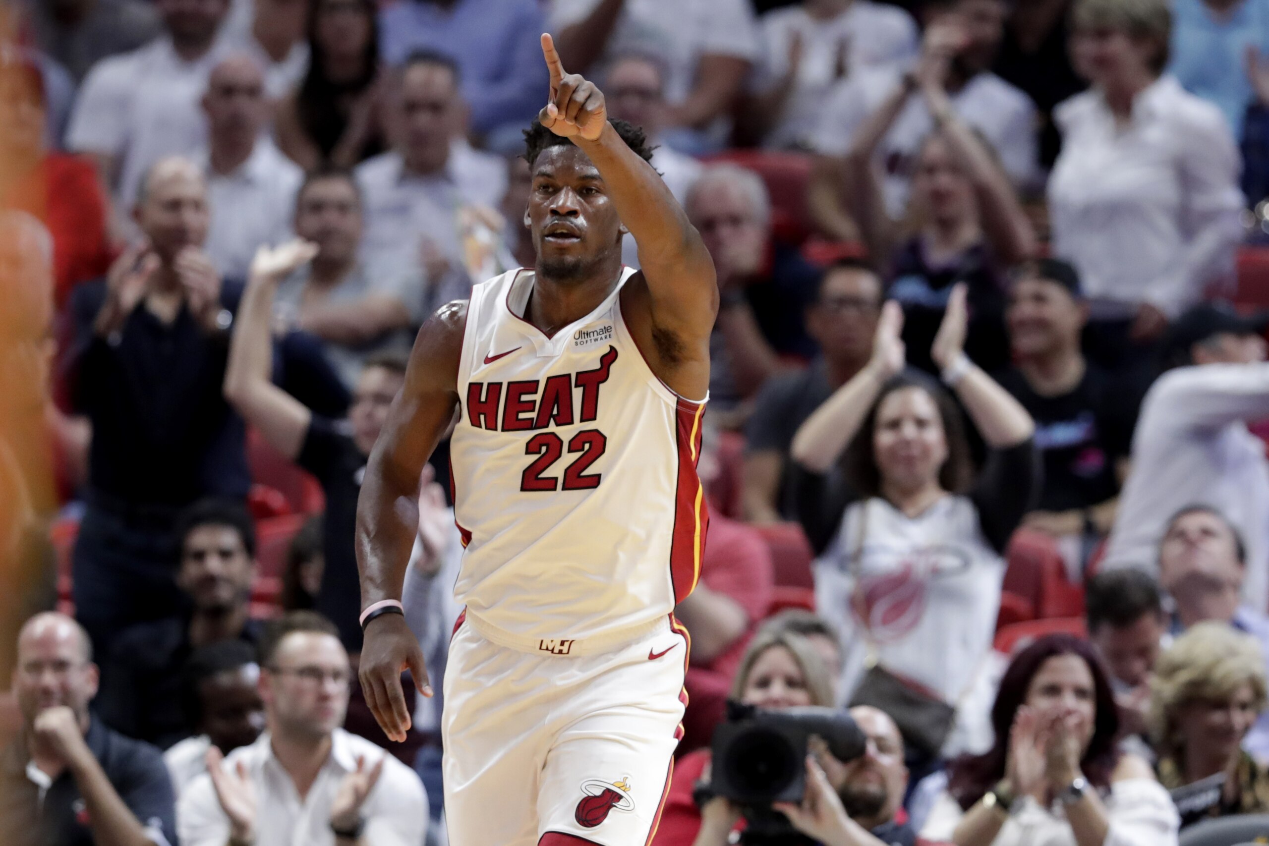 Miami Heat forward Jimmy Butler (22) reacts after scoring during the first half of the team's NBA basketball game against the Atlanta Hawks, Tuesday, Oct. 29, 2019, in Miami. (AP Photo/Lynne Sladky)