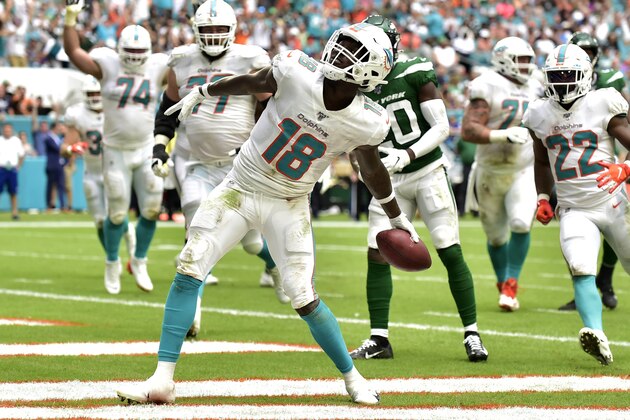 MIAMI, FL - NOVEMBER 03: Preston Williams #18 of the Miami Dolphins celebrates after scoring a touchdown in the second quarter against the New York Jets at Hard Rock Stadium on November 3, 2019 in Miami, Florida. (Photo by Eric Espada/Getty Images)