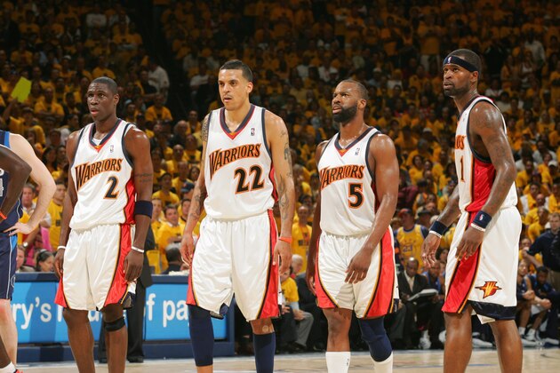OAKLAND, CA - MAY 3:  (L-R) Mickael Pietrus #2, Matt Barnes #22, Baron Davis #5 and Stephen Jackson #1 of the Golden State Warriors walk upcourt in Game Six of the Western Conference Quarterfinals against the Dallas Mavericks during the 2007 NBA Playoffs at Oracle Arena on May 3, 2007 in Oakland, California.  The Warriors won 111-86 and won the series 4-2..  NOTE TO USER: User expressly acknowledges and agrees that, by downloading and/or using this Photograph, user is consenting to the terms and conditions of the Getty Images License Agreement. Mandatory Copyright Notice: Copyright 2007 NBAE  (Photo by Rocky Widner/NBAE via Getty Images)