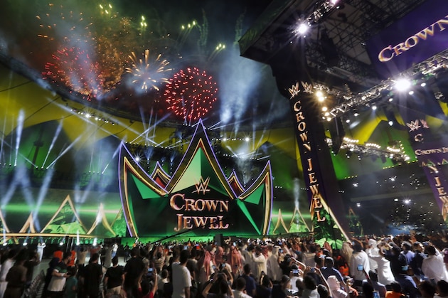 Saudi wrestling watch fire works during the World Wrestling Entertainment