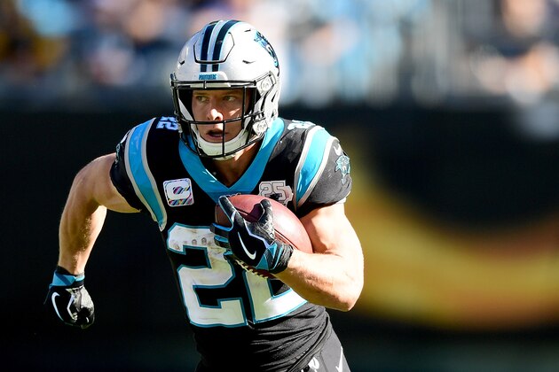CHARLOTTE, NORTH CAROLINA - NOVEMBER 03: Christian McCaffrey #22 of the Carolina Panthers runs with the ball in the second quarter during their game against the Tennessee Titans at Bank of America Stadium on November 03, 2019 in Charlotte, North Carolina. (Photo by Jacob Kupferman/Getty Images)