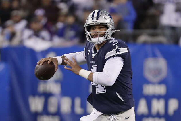 Dallas Cowboys quarterback Dak Prescott (4) rolls out of the pocket to pass during the first quarter of an NFL football game against the New York Giants, Monday, Nov. 4, 2019, in East Rutherford, N.J. (AP Photo/Adam Hunger) Dallas Cowboys quarterback Dak Prescott (4) rolls out of the pocket to pass during the first quarter of an NFL football game against the New York Giants, Monday, Nov. 4, 2019, in East Rutherford, N.J. (AP Photo/Adam Hunger)