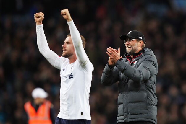 BIRMINGHAM, ENGLAND - NOVEMBER 02: Jurgen Klopp, Manager of Liverpool and Jordan Henderson of Liverpool celebrate following their sides victory in the Premier League match between Aston Villa and Liverpool FC at Villa Park on November 02, 2019 in Birmingham, United Kingdom. (Photo by Marc Atkins/Getty Images)