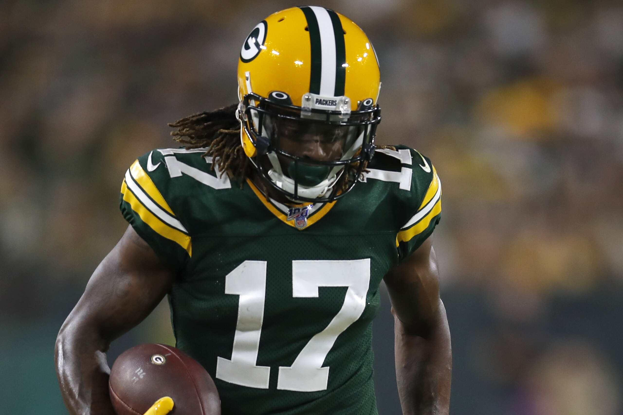 Green Bay Packers wide receiver Davante Adams (17) runs with the ball after a catch against the Philadelphia Eagles during an NFL football game, Thursday, Sept. 26, 2019, in Green Bay, Wis. The Eagles defeated the Packers 34-27. (Jeff Haynes/AP Images for Panini)