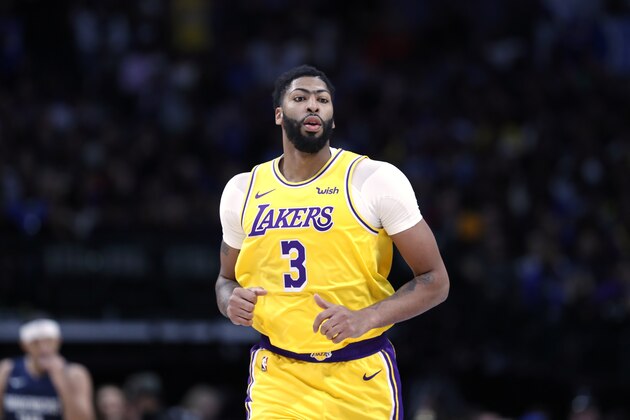 Los Angeles Lakers forward Anthony Davis (3) jogs up court during an NBA basketball game against the Dallas Mavericks in Dallas, Friday, Nov. 1, 2019. (AP Photo/Tony Gutierrez)