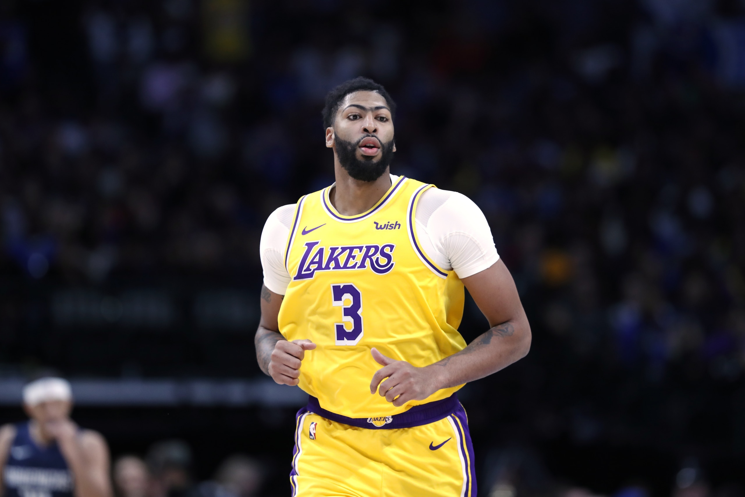 Los Angeles Lakers forward Anthony Davis (3) jogs up court during an NBA basketball game against the Dallas Mavericks in Dallas, Friday, Nov. 1, 2019. (AP Photo/Tony Gutierrez) Los Angeles Lakers forward Anthony Davis (3) jogs up court during an NBA basketball game against the Dallas Mavericks in Dallas, Friday, Nov. 1, 2019. (AP Photo/Tony Gutierrez)