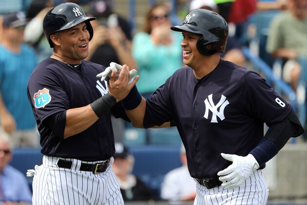 CLEARWATER, FL- MARCH 03:  Alex Rodriguez #13 of the New York Yankees celebrates with Carlos Beltran #36 after hitting a two run home run in the first inning during the game against the Philadelphia Phillies at George M. Steinbrenner Field on March 3, 2016 in Clearwater, Florida.  (Photo by Justin K. Aller/Getty Images)