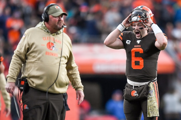 DENVER, CO - NOVEMBER 3:  Baker Mayfield #6 of the Cleveland Browns has words with head coach Freddie Kitchens of the Cleveland Browns as they consider challenging the result of a play against the Denver Broncos in the third quarter of a game at Empower Field at Mile High on November 3, 2019 in Denver, Colorado.  (Photo by Dustin Bradford/Getty Images)